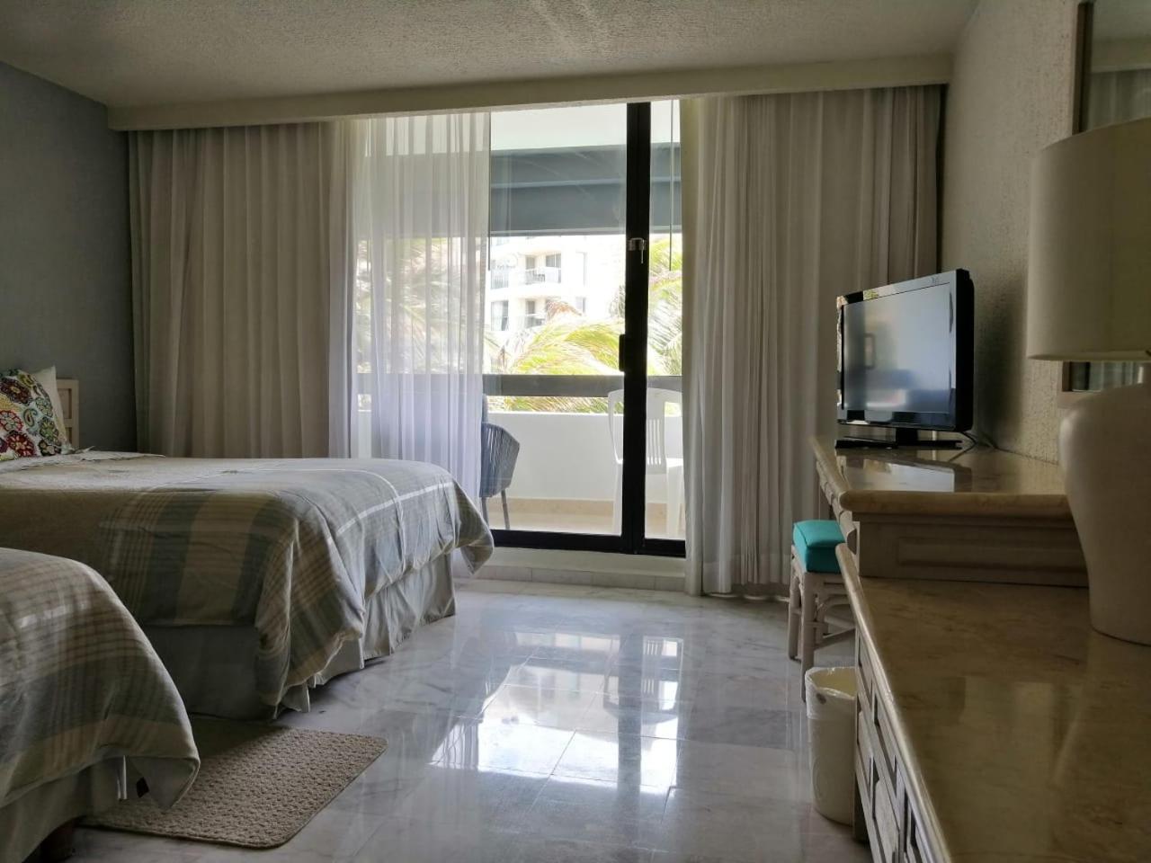 Amplio Frente Al Mar Apartahotel *