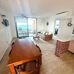 Escape To Serenity By The Sea! Beachfront Apartment With Pool, Just 5 Minutes From The Ferry